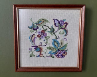Embroidery of Purple flowers in a brown wooden frame