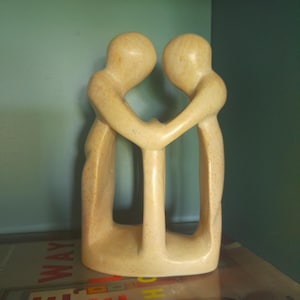 Soapstone figure of a couple