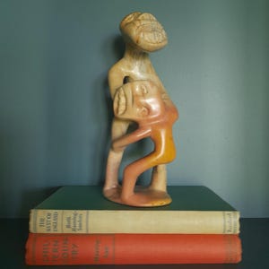 Hand carved soapstone sculpture of two figures