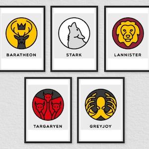Könnte beinhalten: Fünf gerahmte Drucke mit schwarzen Rahmen und weißen Hintergründen. Jeder Druck zeigt ein anderes Haussiegel aus der Fernsehserie Game of Thrones. Die Siegel sind ein Hirsch mit einer Krone, ein Wolf, ein Löwe, ein dreiköpfiger Drache und ein Kraken.