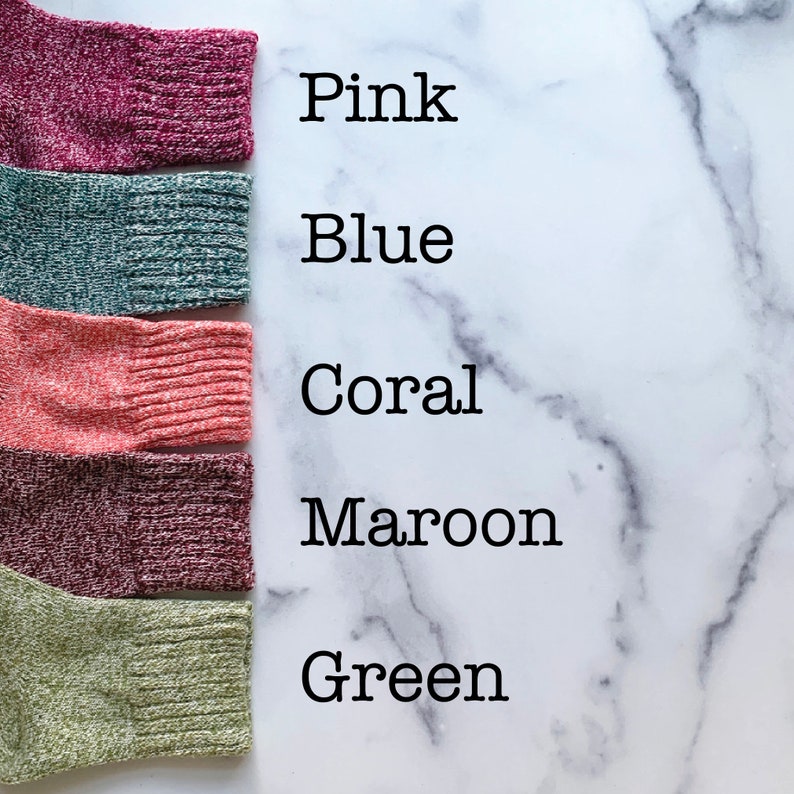 May include: Five different colored knitted fabric swatches, labeled "Pink", "Blue", "Coral", "Maroon", and "Green".