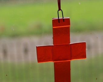 Cross in fused glass for use as a sun catcher or Christmas tree ornament.