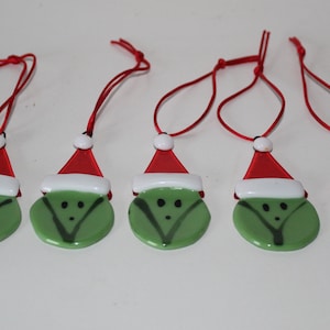 Sprout Christmas tree decoration in fused glass. These happy sprout have their Santa hats on.