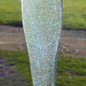 Icicle shaped Christmas tree decorations, clear with a hint of blue to give them a frosty look  All handmade and made to order. 6 in a set