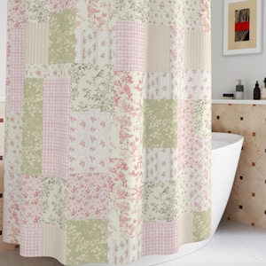 May include: A patchwork shower curtain with a floral and gingham pattern in shades of pink, green, and cream. The curtain hangs from a curved, silver-coloured rod. The bathroom has white walls and a white bathtub.