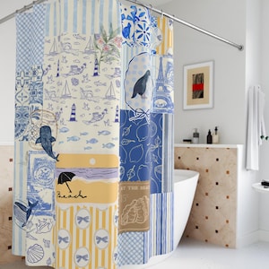 May include: A patchwork shower curtain with a nautical theme. The design features various blue and white patterns, including stripes, sailboats, and illustrations of whales and seashells. The word "Beach" is visible on a yellow panel.