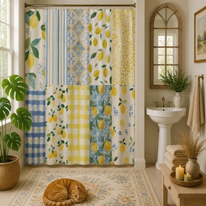 May include: A patchwork shower curtain featuring vertical panels with various patterns including yellow lemons, blue and white stripes, blue and yellow tile motifs, yellow gingham, and yellow polka dots, suspended from a bronze-toned metal rod.