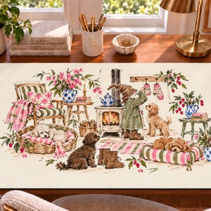 May include: A rectangular desk mat featuring a detailed illustration of a cozy room with a fireplace, a gnome, and three dogs. The scene includes a wicker basket, a striped pet bed, a green armchair, and various floral accents in shades of pink and green.