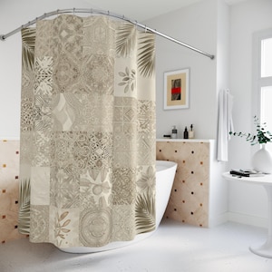 May include: A beige and tan patchwork shower curtain with various patterns, including floral and geometric designs. The curtain hangs from a curved, silver-colored shower rod. Palm frond and leaf motifs are also present in the design. The curtain is in a bathroom setting.