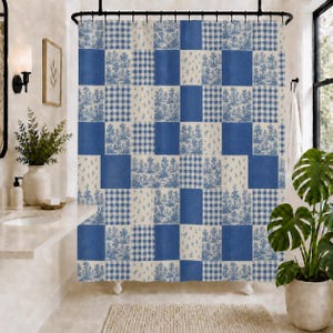 May include: A shower curtain featuring a blue and white patchwork design. The pattern consists of alternating squares displaying a blue gingham check, a solid blue color, and a white background with a blue floral toile print of trees and plants.