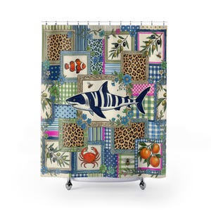 May include: A shower curtain with a patchwork design featuring a shark, leopard print, olives, and other marine life. The curtain has a variety of patterns, including stripes, polka dots, and gingham, in shades of blue, green, and pink.