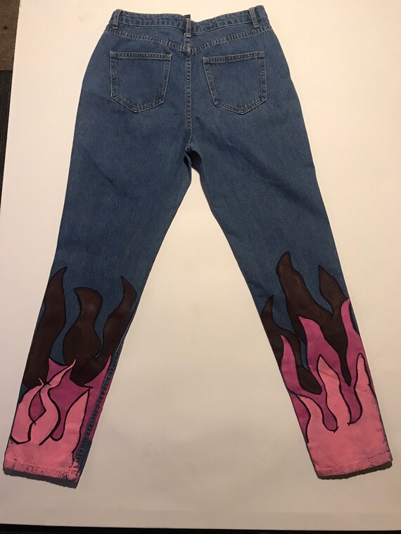 flames painted on jeans
