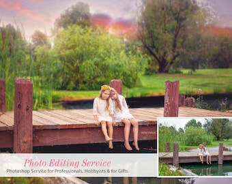 May include: Two young girls in white dresses sit on a wooden dock over water, with a lush green background. The dock has red-brown posts. The sky has a soft pink and orange sunset. The image includes the text "Photo Editing Service".