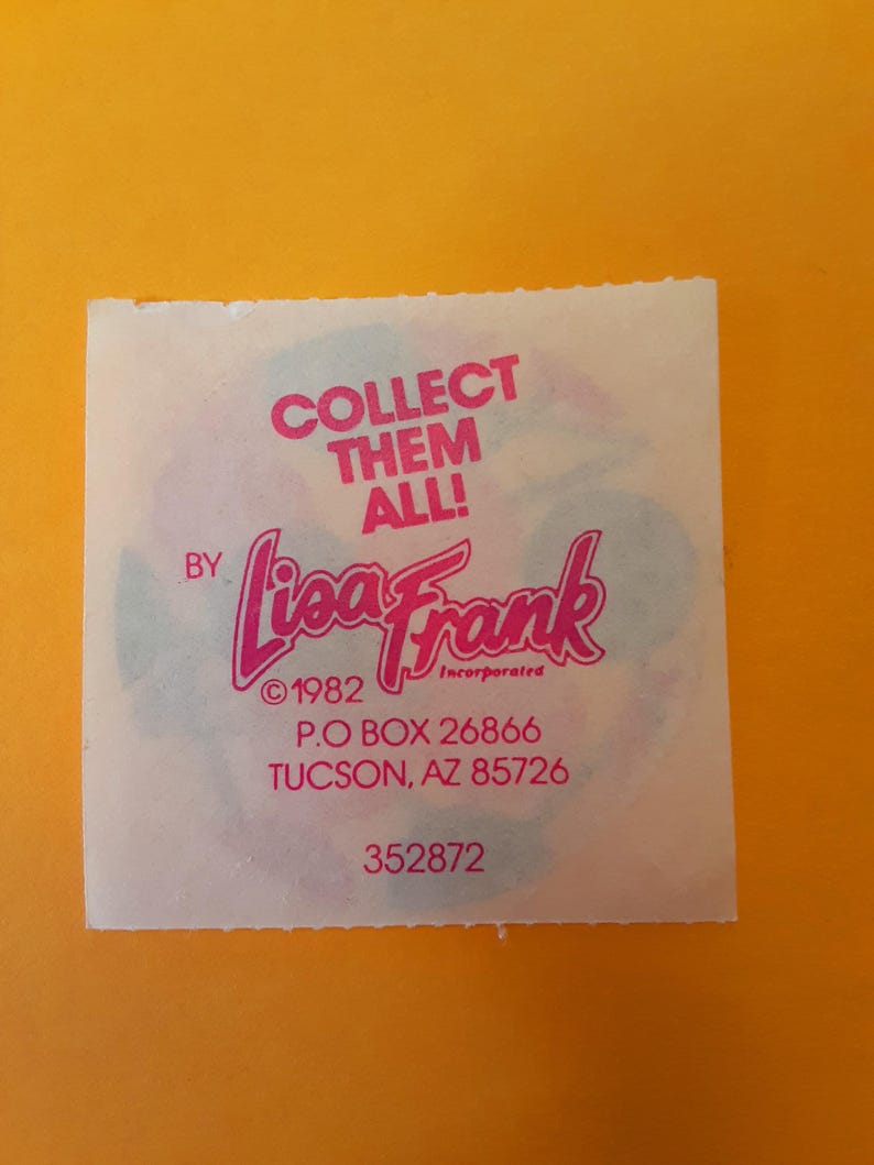 May include: A square sticker with the text "COLLECT THEM ALL!" and the Lisa Frank logo in pink. The sticker also includes the text "&copy;1982 Incorporated" and an address in Tucson, AZ. The background is yellow.