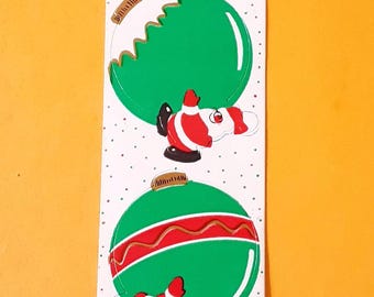 Tira de pegatinas vintage de los años 80 de CARDesign con Papás ​​Noel y adornos