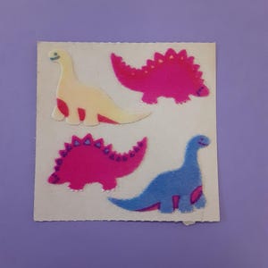 vintage 80s Sandylion fuzzy dinosaurs sticker module brown backing