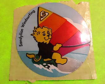 RARE! vintage 80s Sandylion mylar lion windsurfing sticker module *damaged*
