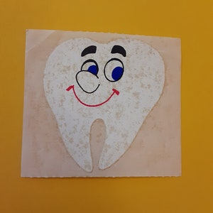 módulo de adesivo de dente de sandylion vintage dos anos 80 *danificado*