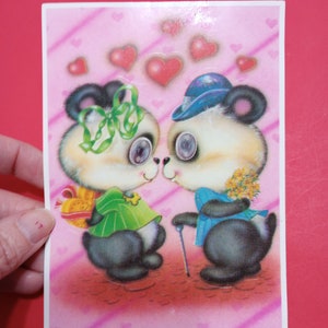 Joli couple de pandas vintage des années 80 avec yeux lenticulaires en feuille d'autocollants
