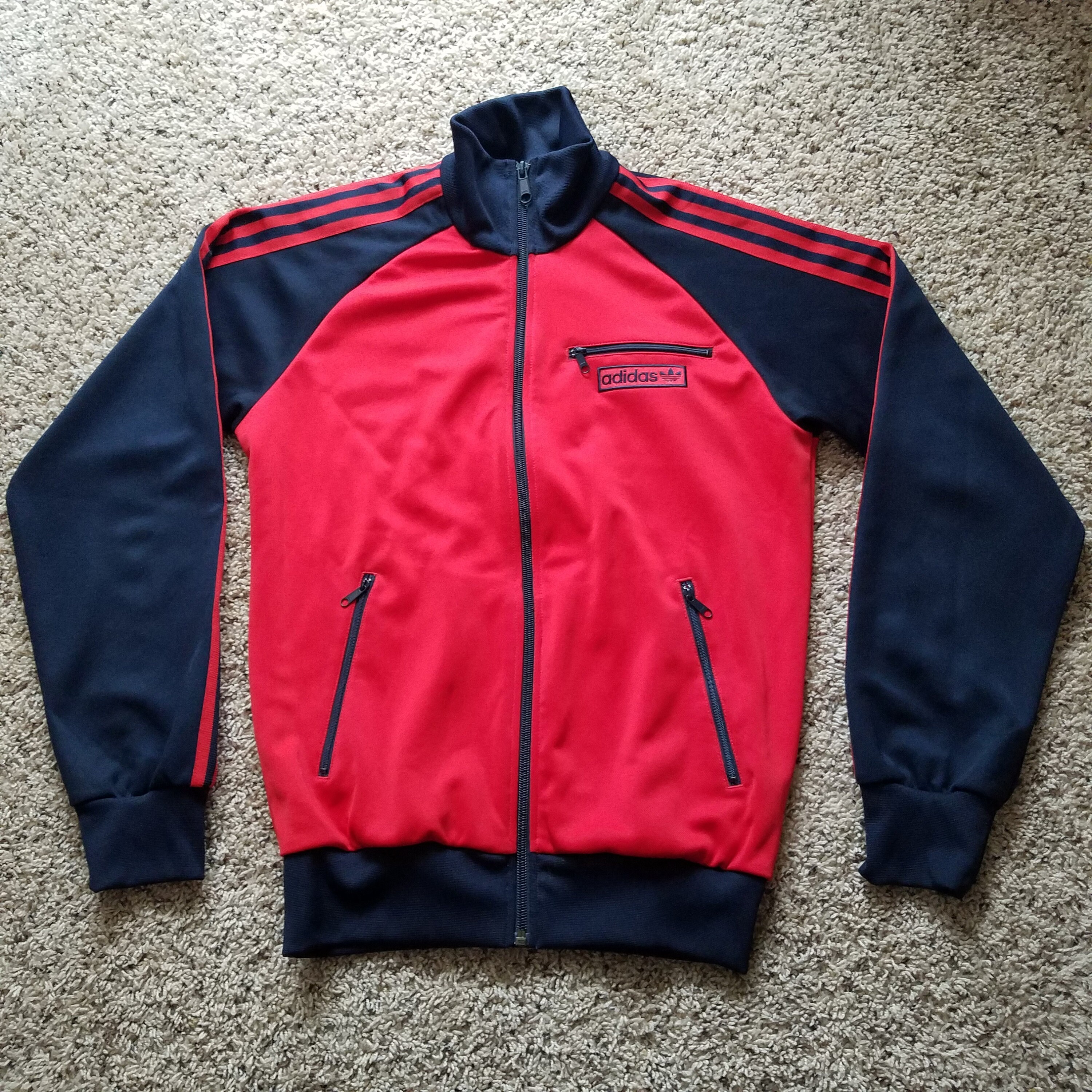navy blue and red jacket