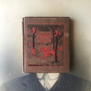 May include: A vintage children's picture book with a brown cover and red text. The title is "Caldecott's Picture Book". The cover features an illustration of children riding horses in a woodland.