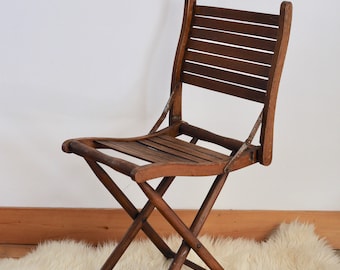 Folding chair in old wood, vintage