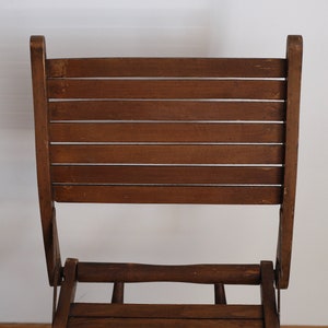 Chaise pliante en bois ancienne ,vintage image 4