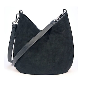 Bolso bandolera o de hombro tipo hobo de ante negro para mujer con forro de algodón estampado