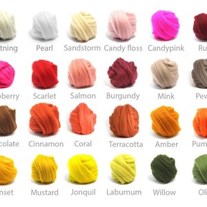 May include: A collection of colorful yarn skeins in various shades, including Lightning, Pearl, Sandstorm, and Ruby. Each skein is labeled with its color name, offering a diverse palette for crafting projects. The image showcases a range of hues from soft pastels to vibrant jewel tones.