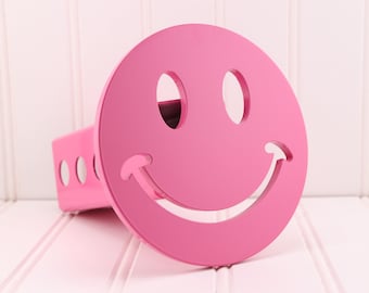 Cubierta de enganche con cara sonriente rosa: compatible con receptores de enganche de 2"
