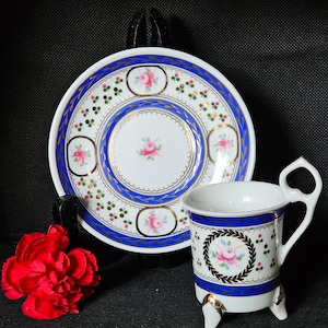 Vintage collectible ROYAL VIENNA porcelain cup & saucer flowers and blue edges