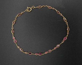 Armbandset mit 30 Rubinen, 18 Karat Gold.