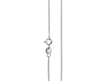May include: A silver chain necklace with a lobster clasp.