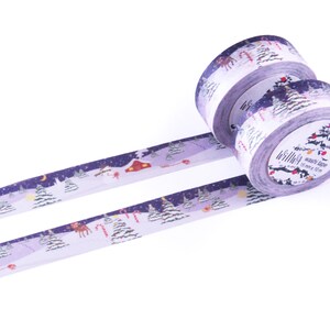 May include: Purple washi tape with a winter scene featuring snow-covered trees, a house, and a reindeer. The tape is 15 mm wide and 10 m long.
