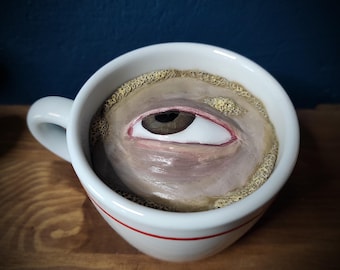 Tasse œil surréaliste onirique étrange bisarr konst