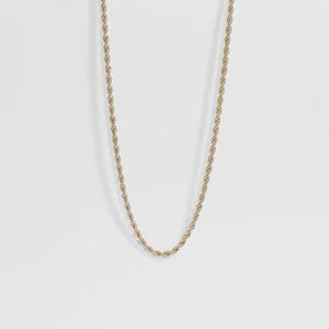 May include: A gold-toned rope chain necklace featuring a twisted, spiraling metal link design. The chain is displayed in a simple U-shape, showcasing the uniform texture and metallic finish of the interconnected links throughout the entire length.