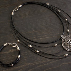 Women&#39;s Bracelet & Necklace Set, Hand crafted from metal (silver plated with patina), leather cord KO 111
