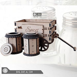 May include: A wooden spice rack set with a cart design, featuring two cylindrical spice containers and a cart labeled "Spices." The set includes a decorative wheel and handle. The dimensions are 140mm x 88mm x 110mm.