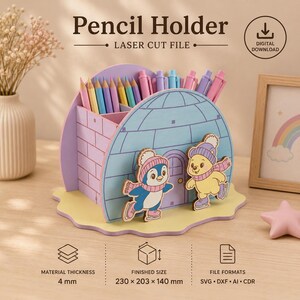 May include: A wooden pencil holder laser cut file featuring an igloo design with a light blue and purple color scheme. The front displays a cartoon penguin and a bear wearing winter gear. It measures 230 x 203 x 140 mm with 4 mm material thickness.