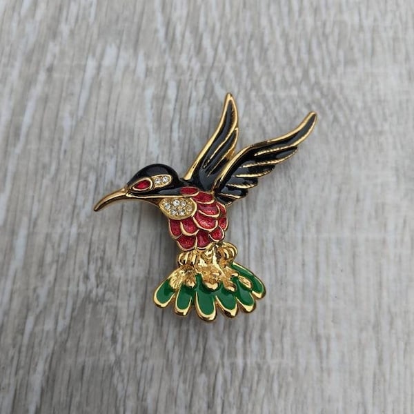 Sphinx Black, Red, and Green Enamel, Clear Rhinestone, and Gold Tone Metal Hummingbird in Flight Brooch