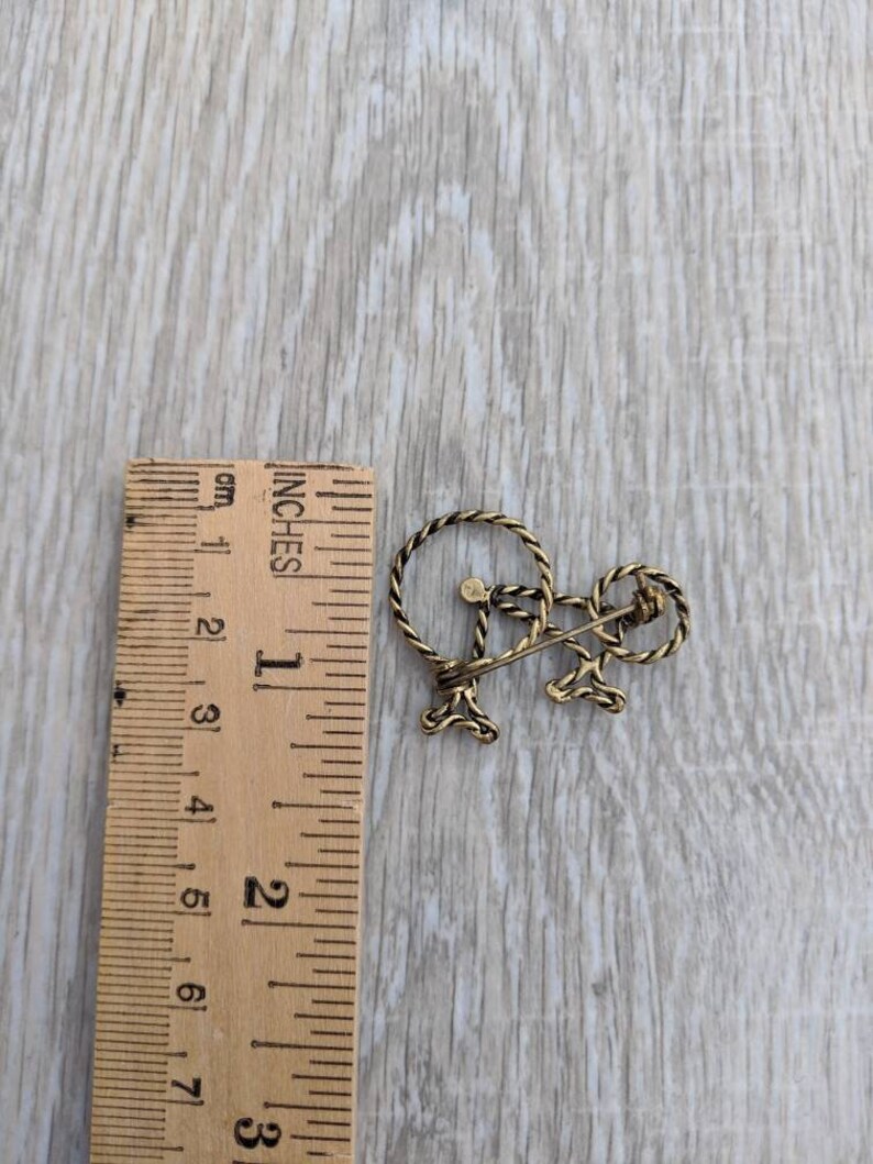 Jet Black Rhinestone and Bright Amber Colored Rhinestone Penny-Farthing or High Wheel Bicycle Brooch Bronze Tone Twisted Metal