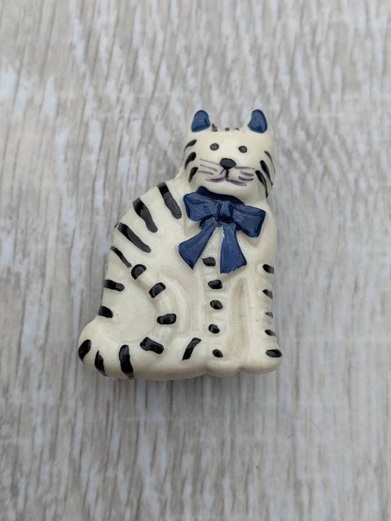White Resin Cat with Black Stripes and a Navy Blu… - image 10