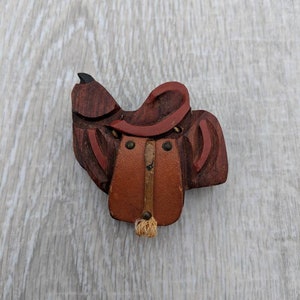 Hand Carved Wood Saddle with Leather Saddle Bag and Stirrups Brooch