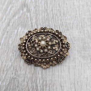 Edwardian Style Antiqued Gold Tone Metal and Faux Seed Pearl Flower and Shamrock Filigree Dome Brooch