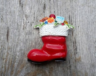 Arthur Pepper (Art) Enamel and Rhinestone Santa Claus Boot Filled with Gifts and Holly Brooch