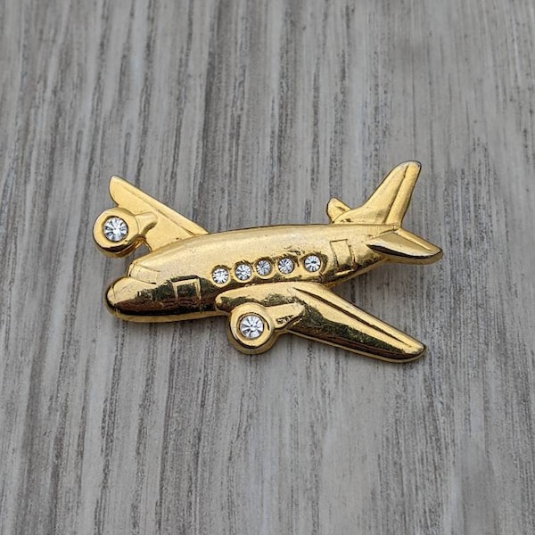 Gold Tone Metal and Clear Rhinestone Airplane Brooch