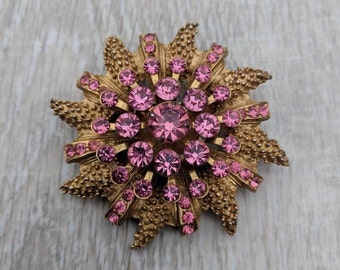 Pink Rhinestone and Gold Tone Sunburst Brooch