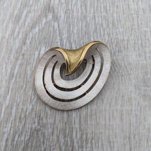 JJ Satin Finish White Enamel and Gold Tone Metal Abstract Swirl Brooch