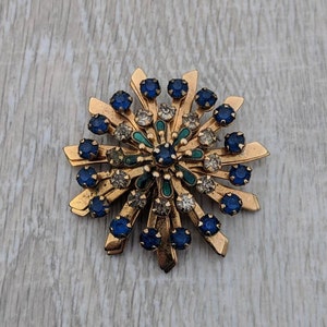 Gold Tone, Blue and Clear Rhinestone, and Teal Enamel Sunburst Brooch
