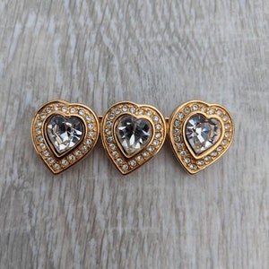 Swarovski Swan Logo Clear Crystal and Gold Plated Metal Trio of Hearts Bar Brooch